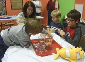Kids participate in Hands-On Science Day at Spark! Imagination and Science Center